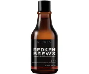 Redken Brews 3-in-1 shampoo bottle, dark amber brown with black cap