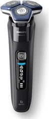 Electric shaver with blue indicator lights and SkinIQ button panel