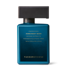 Hand/body wash bottle with flip-top cap, turquoise blue label
