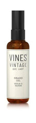 Amber beard oil bottle with black cap, label reading VINES Vintage and 100ml