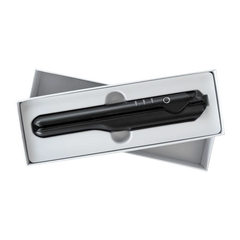 Black mini cordless hair straightener in open box with white insert