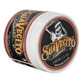 Clay pomade jar with black, red, gold label and skull graphic on lid