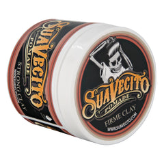 Clay pomade jar with black, red, gold label and skull graphic on lid