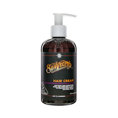 Suavecito hair cream bottle with pump, dark amber/black container and purple label.
