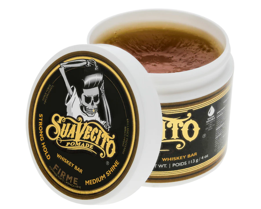 Whiskey bar pomade jar with gold-and-black lid label; open lid shows amber product