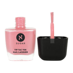 Pink nail lacquer bottle with brush and glossy polish swatch