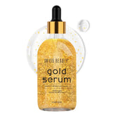 Gold serum bottle with black dropper; amber-gold serum in clear glass vial