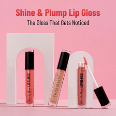 Assorted pink lip gloss tubes with black caps and wand applicators