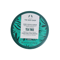 Tea tree hair and scalp scrub jar, teal round tub with label