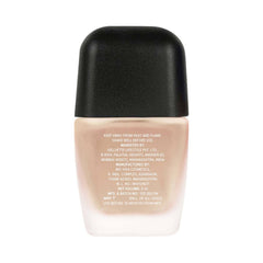 Matte nail lacquer bottle with black cap, beige nude shade