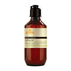 Angel setting gel bottle with dark amber pump top and cream label