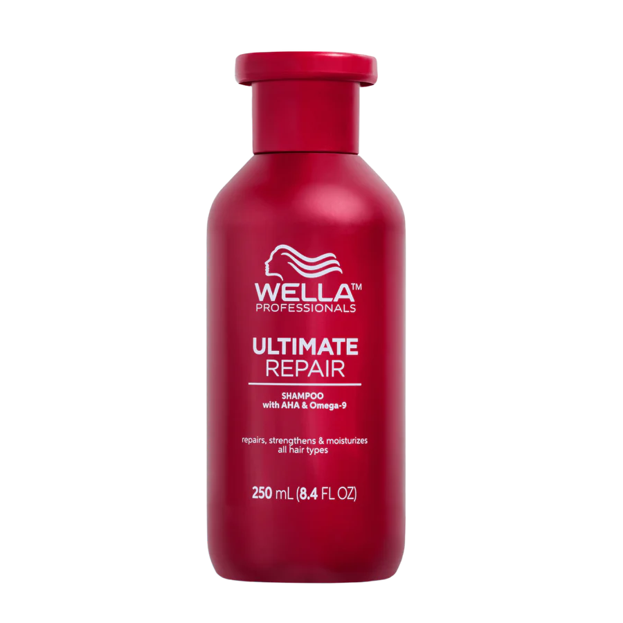 Red shampoo bottle with Wella Professionals Ultimate Repair label, 250 ml