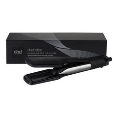 Black hot air 2-in-1 hair styler lying on its retail box