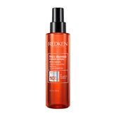 Redken Frizz Dismiss oil-in-serum bottle, 125 ml, amber pump