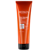 Hair frizz-dismissing cream tube, red with black cap and REDKEN label