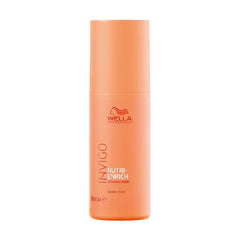 Wella Professionals Invigo Nutri Enrich Wonder Balm bottle, peach orange, with flip top