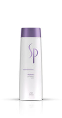 Shampoo bottle with purple cap and white body, Wella SP logo