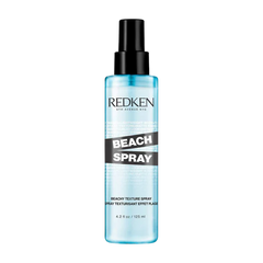 Redken Beach Spray hair spray bottle, 125 ml, clear blue liquid.