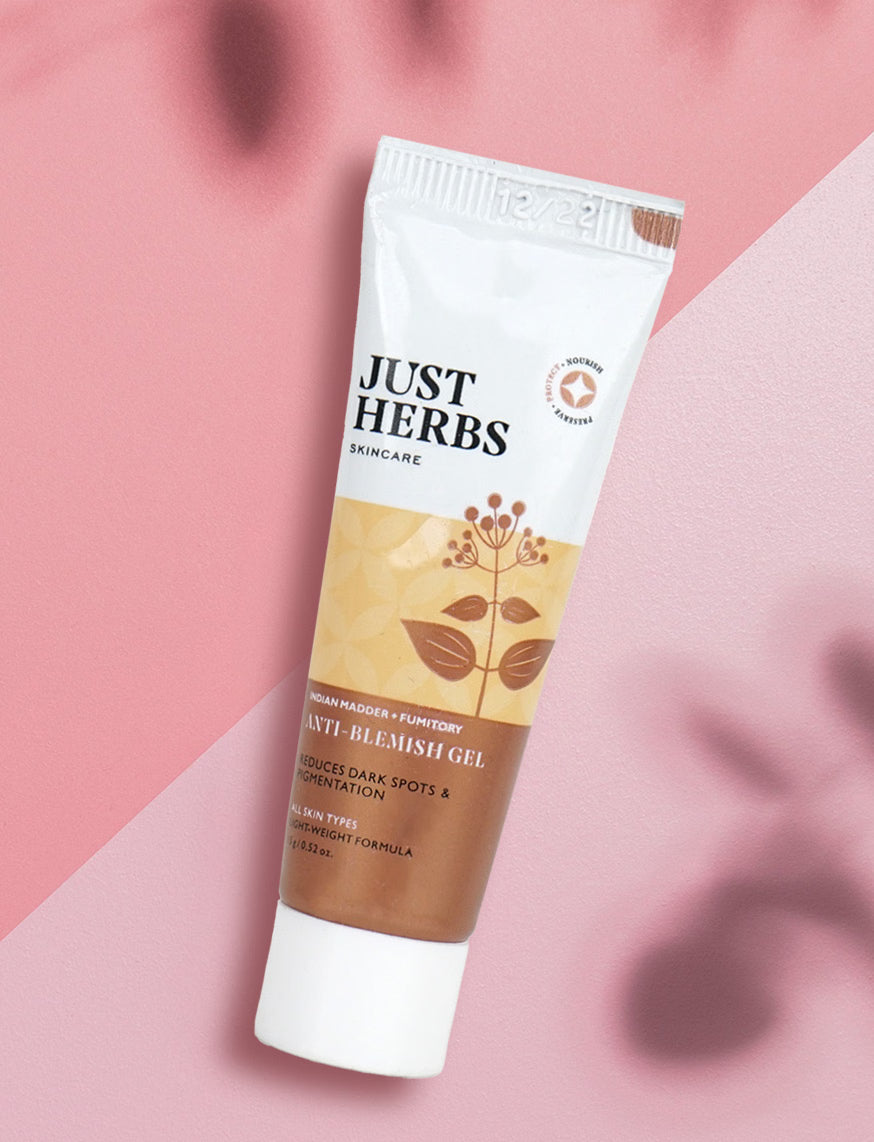 Anti-blemish gel tube with Just Herbs logo and brown leaf design