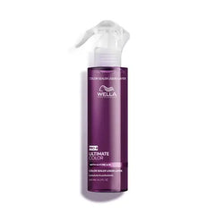 Wella Ultimate Color leave-in sealer bottle with white spray nozzle; purple liquid