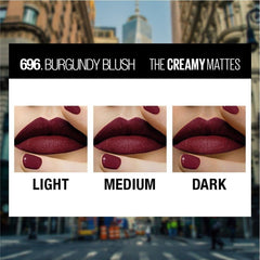 Burgundy lip color swatch with creamy matte lipstick.