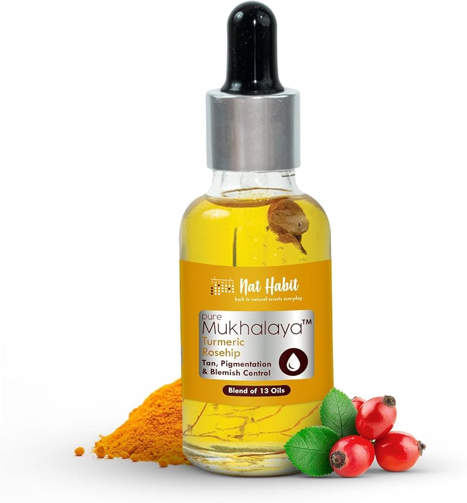 Amber turmeric rosehip face oil bottle with black dropper cap and label, 30ml