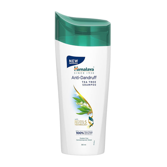 Anti-dandruff tea tree shampoo bottle, white with green cap and front label.