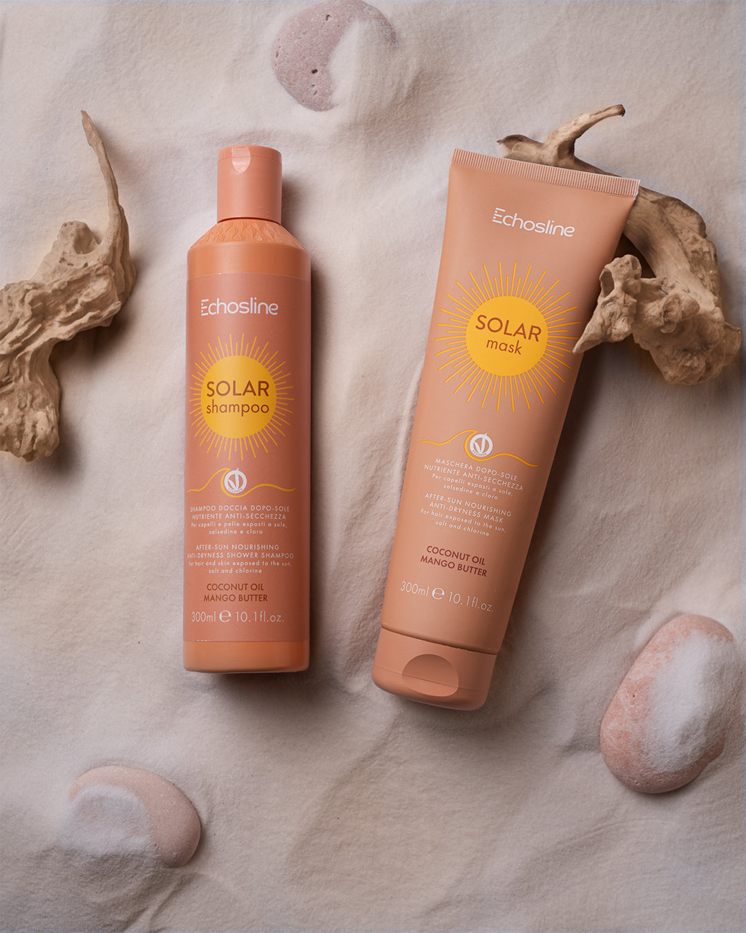 Solar shampoo bottle and Solar mask tube on light fabric, peach-brown hair care