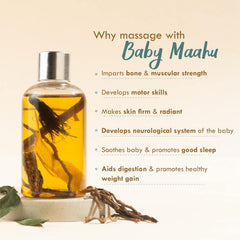 Baby massage oil bottle with silver cap and amber oil with dried herb pieces