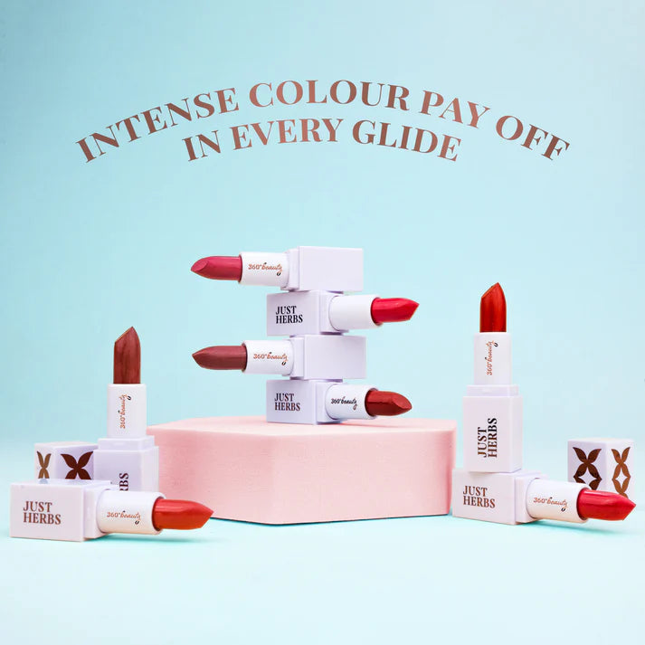 Assorted pink mini lipsticks with white boxes and stacked display