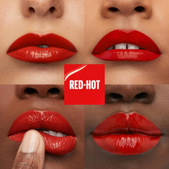 Red glossy liquid lipstick on lips, with applicator and smudged swatch marks