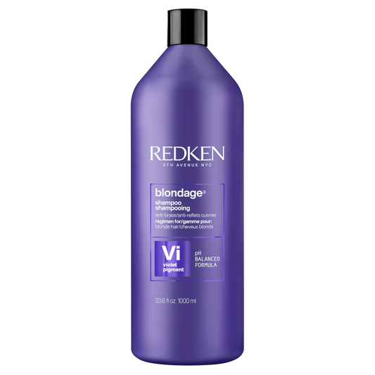 Purple shampoo bottle with black cap, REDKEN Blondage label and violet pigment.