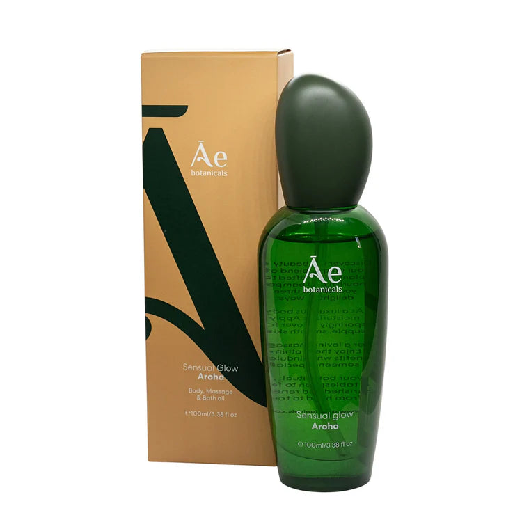 Āe Botanicals Sensual Glow oil with green bottle and tan product box