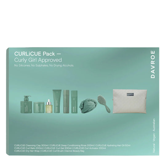 Davroe CURLiCUE curly hair care pack with 8 product bottles in green box