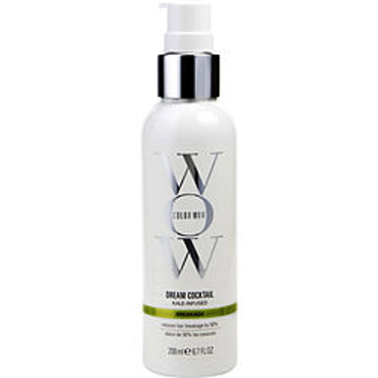 White hair repair treatment bottle with silver pump and green accent label