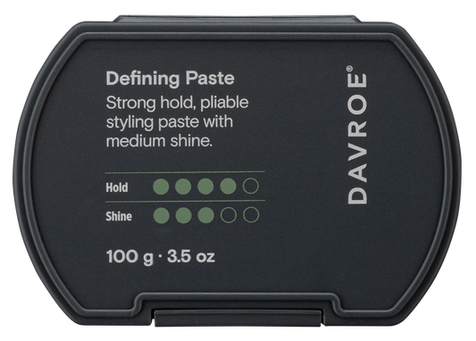 Davroe defining styling paste jar, dark label with hold and shine icons, 100 g