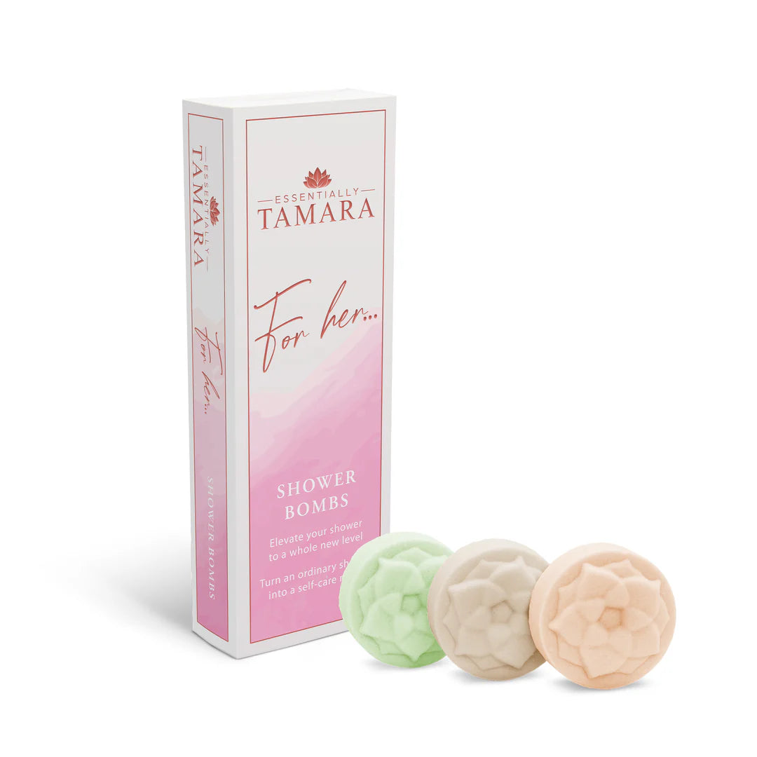 Box of 3 shower bombs with pastel green, beige, and pink round bars