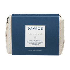 Davroe blue toiletry travel bag with front label and zipper closure