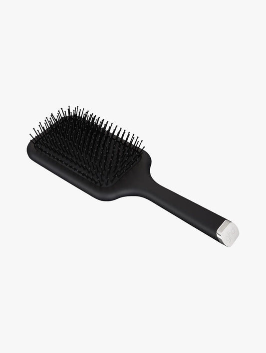 Paddle hair brush with black cushioned base and short bristle pad, black handle