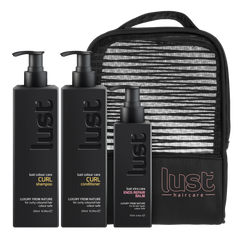 Haircare curl gift set with black shampoo, conditioner, ends balm, and striped travel pouch