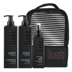 Lust haircare holiday gift set with shampoo, conditioner, beauty cream and striped pouch