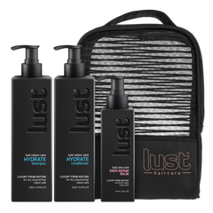 LUST haircare hydrate gift set with shampoo, conditioner, balm bottles and zip pouch