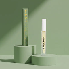 Lip hydrating serum tube with pale yellow applicator, shown on blocks.