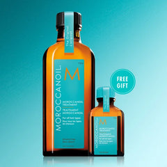 Moroccanoil On-the-Go duo hair treatment bottles, large and travel-size amber bottles