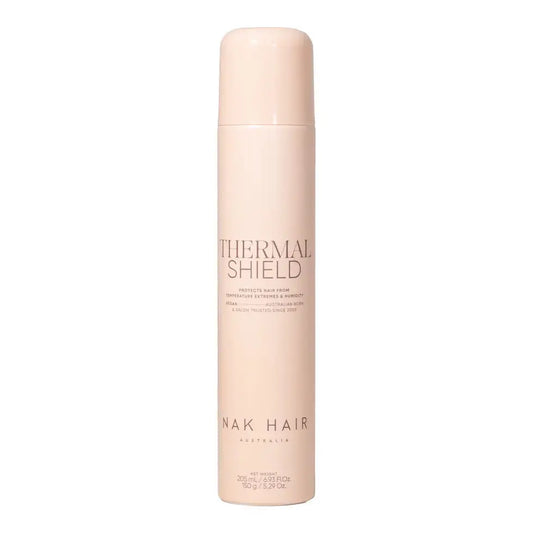 NAK Thermal Shield hair protective spray bottle, tall beige bottle with cap