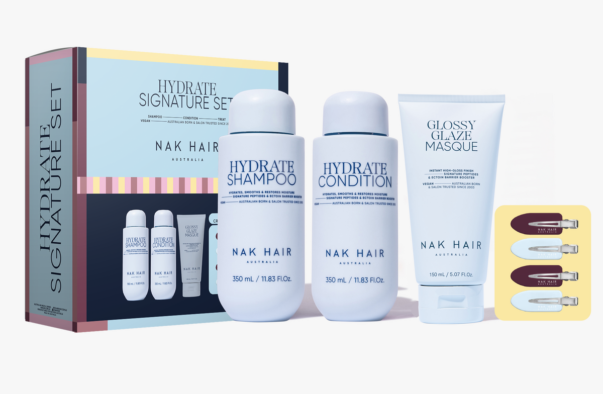 Hair hydrate trio gift set with shampoo, conditioner and masque, shown with bottles in box