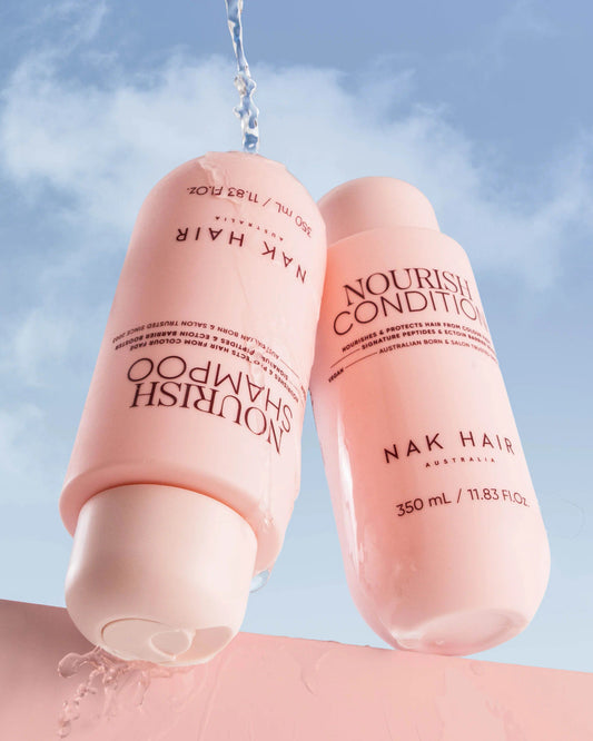 Pink nourish shampoo and conditioner bottles, 350 ml each