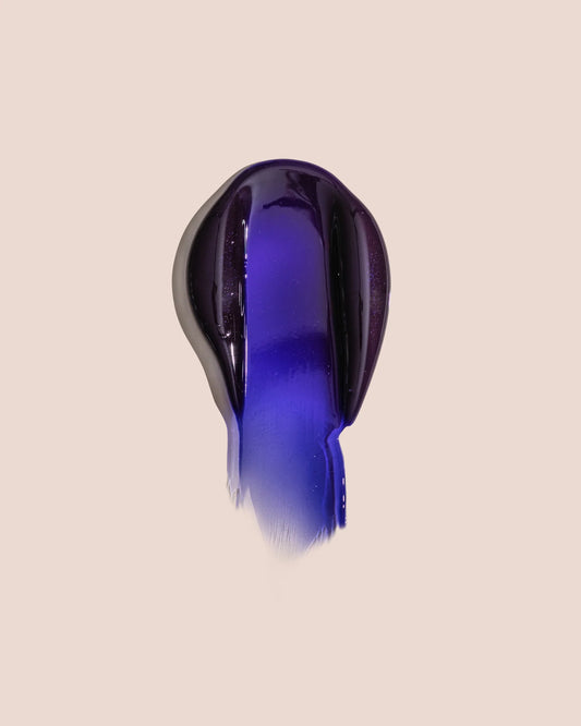 Purple anti-yellow shampoo gel swatch with glossy texture