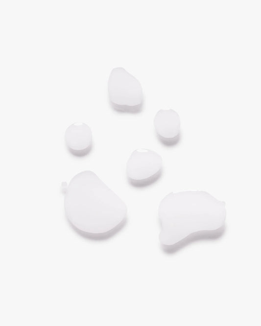 White mist droplets in an irregular scatter pattern