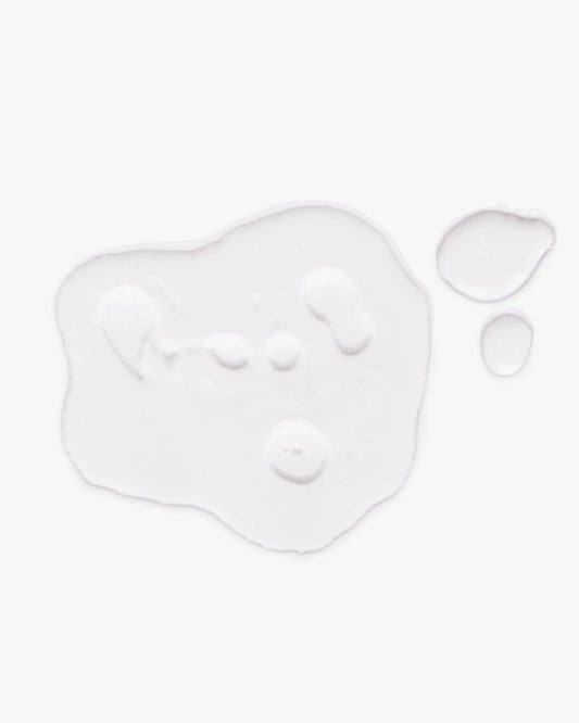 Hair root lift mist applicator pads: white bottle-shaped cutout with small pieces